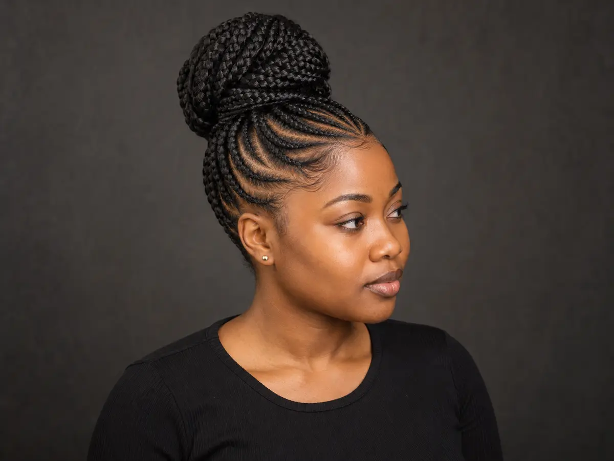 Braided updo hairstyle inspiration — Neat braids gathered into an elegant updo.